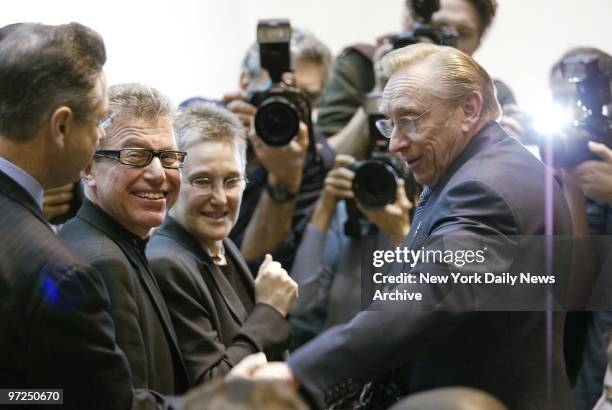Architect Daniel Libeskind shakes hands with developer and twin-towers leaseholder Larry Silverstein at the Winter Garden in the World Financial...