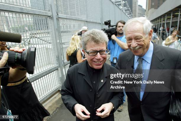 Architect Daniel Liebeskind arrives with Michael Blumenthal, director of the Jewish Museum in Berlin, at Ground Zero on the day after an agreement...