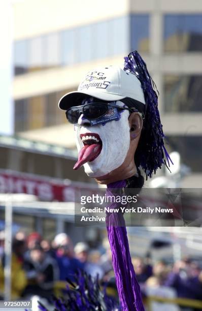 Are Baltimore Ravens' fans suggesting their tongues are hanging out in anticipation of their team taking on the New York Giants in Super Bowl XXXV in...