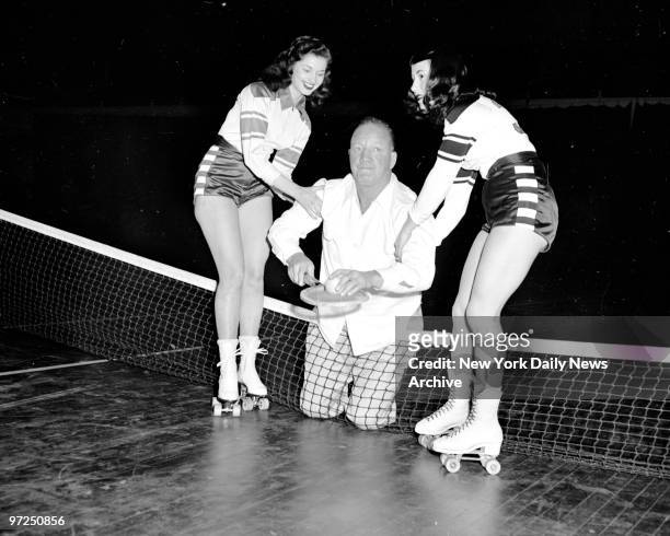 Arlene Buckmann and Carmen Zini, a couple of fast girls from the Roller Derby, come to the assistance of Maxie Rosenbloom, the erstwhile boxer turned...