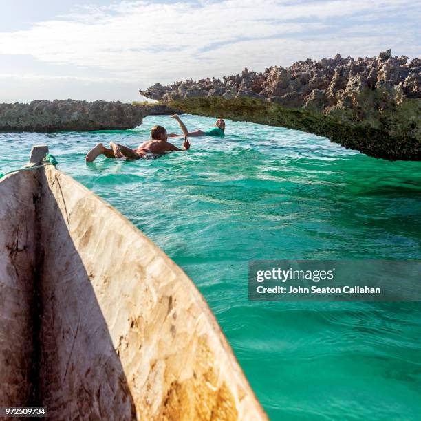 mozambique, mossuril district, surfers - dugout canoe stock pictures, royalty-free photos & images