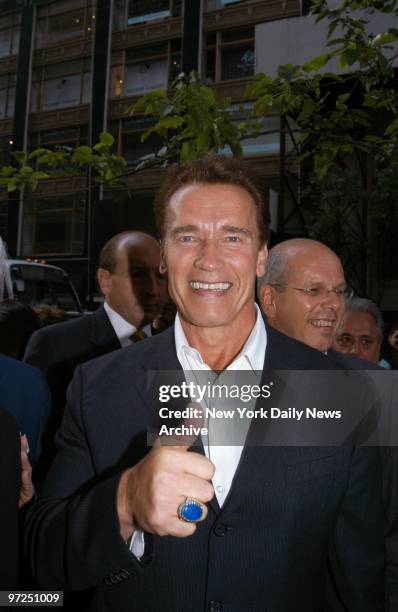 Arnold Schwarzenegger gives a thumbs-up as he arrives for the grand opening of the new Audemars Piguet flagship store on E. 57th St. Schwarzenegger...