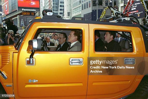 Arnold Schwarzenegger takes Mayor Giuliani for a "ride" in Times Square where the actor was plugging a new Hummer sports utility truck....