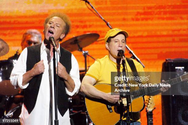 Art Garfunkel and Paul Simon perform during the "From the Big Apple to the Big Easy" benefit concert at Madison Square Garden. Proceeds from the...