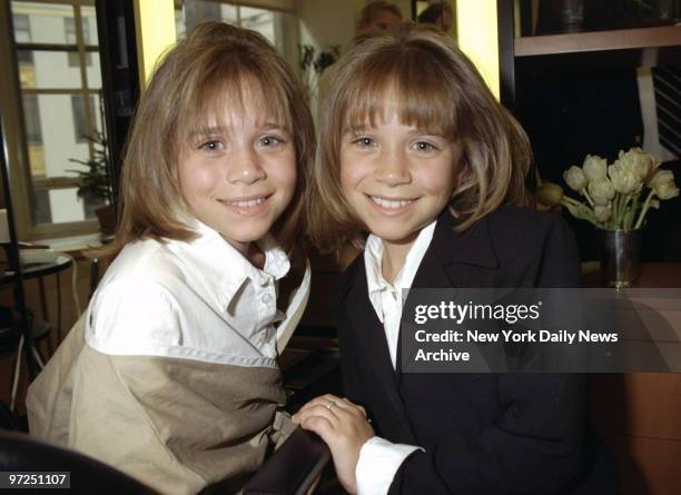 Ashley and Mary Kate Olsen getting hair styled at the John Barrett Salon at Bergdorf Goodman. The Olsen twins are in town for the Audrey Hepburn...