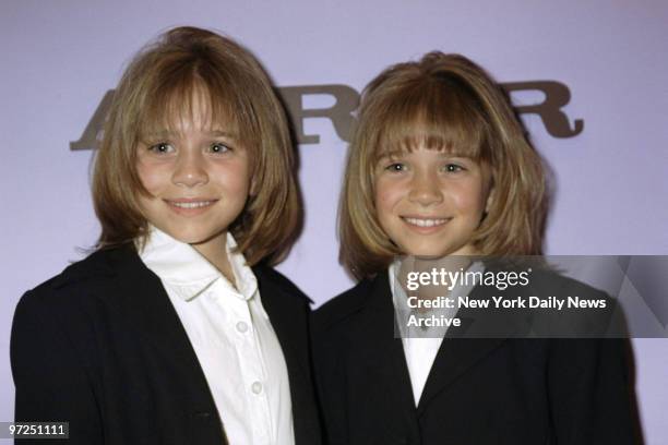 Ashley and Mary Kate Olsen after getting hair styled at the John Barrett Salon at Bergdorf Goodman. The Olsen twins are in town for the Audrey...