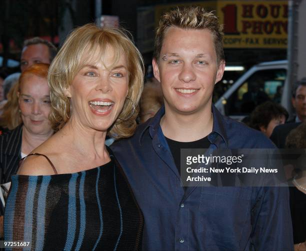Elaine Joyce and son Michael arrive at the Belasco Theatre for the opening of the Broadway play "Frankie and Johnny in the Claire de Lune."