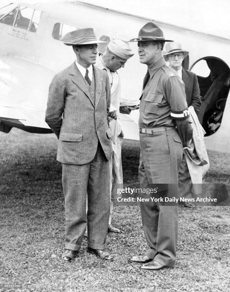 Assistant Secretary of War Robert P. Patterson (left), is gr