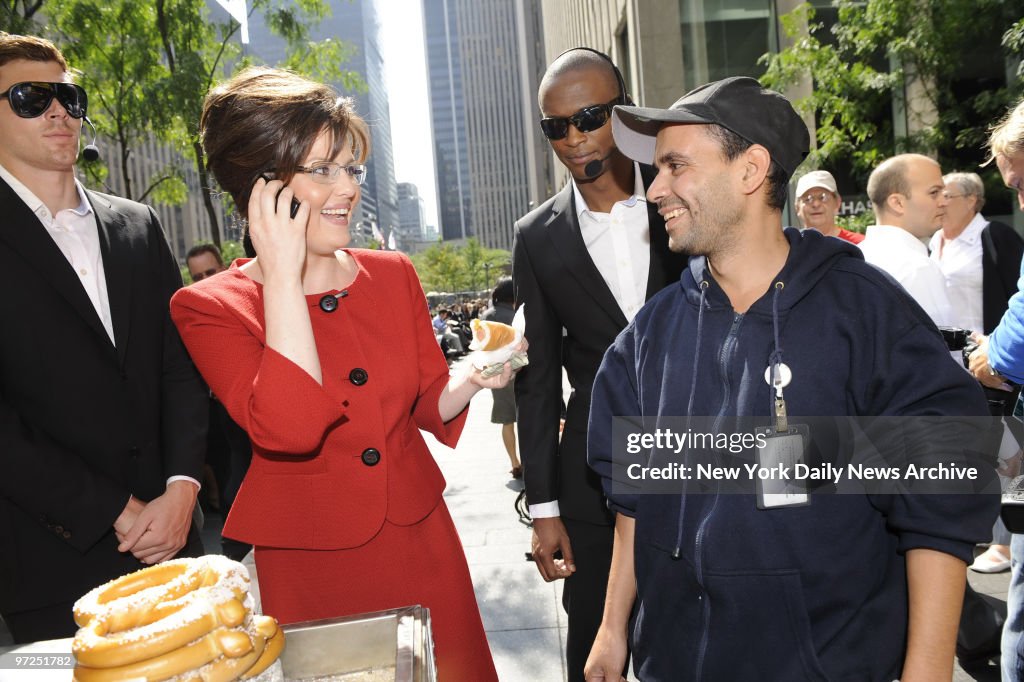 Esameldin Badran (right), a hot dog vendor from Staten Islan