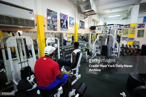 At the Olympic Center, called the Palacio de Deportes, in Santo Domingo where many MLB players train in the off season. The weight room displays many...