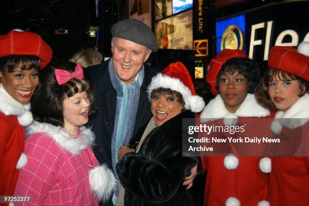 Eartha Kitt and John Lithgow are joined by cast members of the musical "Hairspray" at the lighting of the Broadway Christmas tree in Duffy Square.