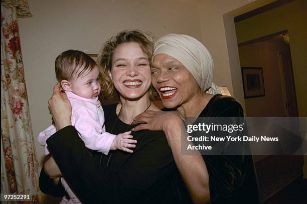 Eartha Kitt has eyes only for her granddaughter Rachel Nora Shapiro, held by her mother Kitt Shapiro. All were on hand for the opening night of...