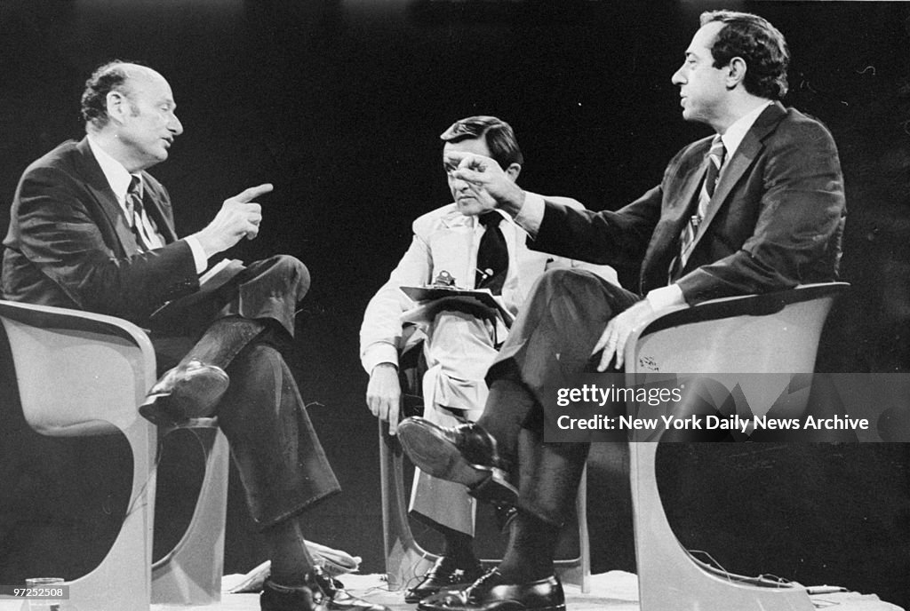 Ed Koch (left) and Mario Cuomo make their points during mayo