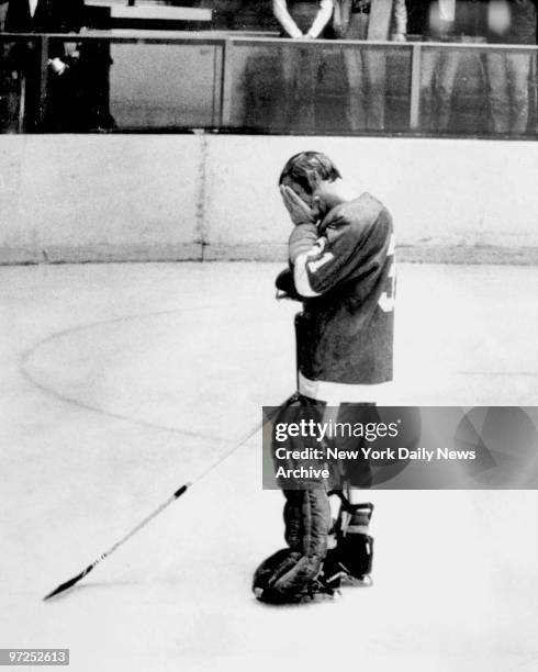 Goalie Eddie Giacomin of the Detroit Red Wings wipes his eyes that fillled up after he was met with a thunderous ovation at the Garden. His Red Wing...