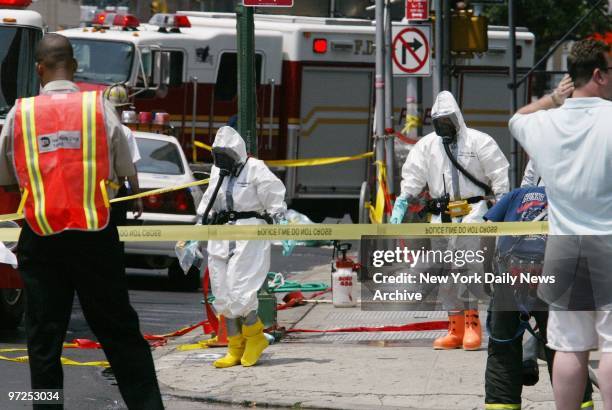 Haz-mat workers at Varick and Canals Sts. After responding to an anthrax scare when a subway rider found a powdery substance in a bag on the...