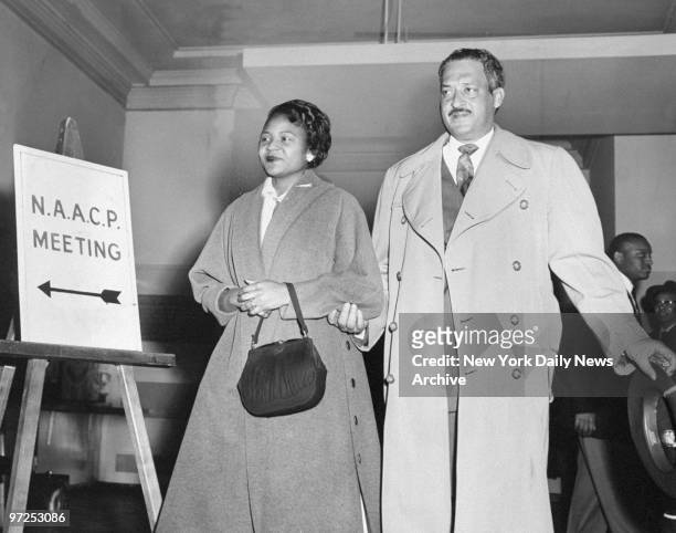 Activist Autherine Lucy and her lawyer Thurgood Marshall entering the NAACP office for a press conference.
