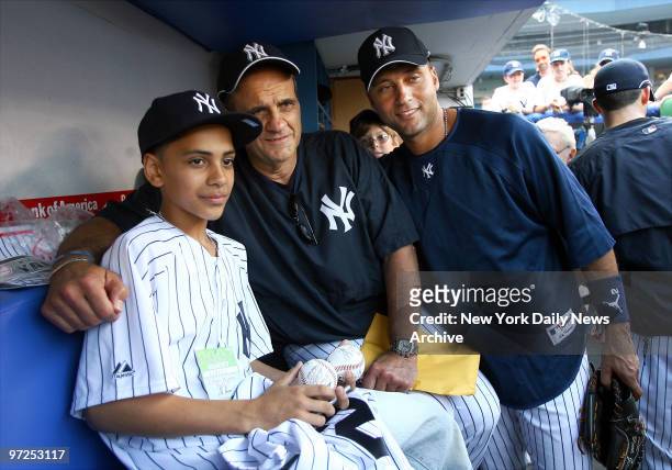 Edwin Alamo who helped cops foil an armed robbery at his Bronx home last week, meets his hero, New York Yankees' shortstop Derek Jeter and Yanks'...