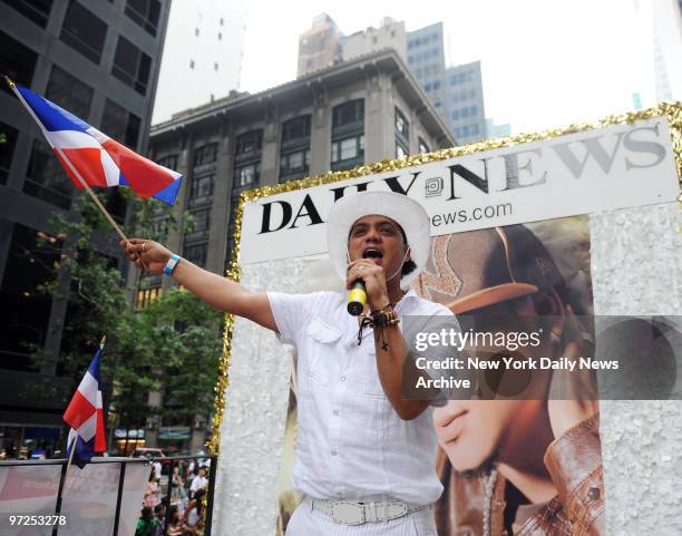 Bachata Sensation, Kiko Rodriguez performs on the New York Daily News float during the 27th Annual Dominican Day Parade along 6th Avenue in Manhattan.