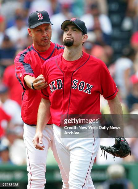 Boston Red Sox's starting pitcher Matt Clement is taken out of the game by manager Terry Francona in the third inning after giving up six runs, five...