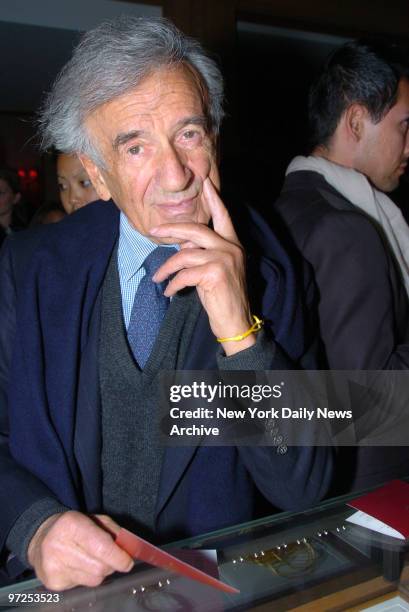 Elie Wiesel, wearing his bracelet, is at the Cartier Mansion on Fifth Ave. For a cocktail party celebrating the Cartier Charity Love Bracelet.