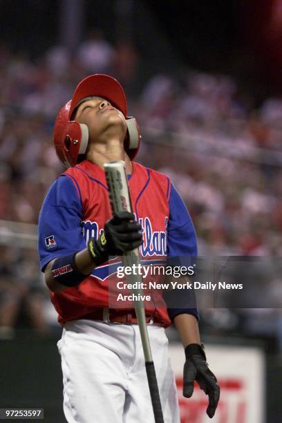 Harlem Little League's Cody Booth reacts as he strikes out during third inning of Little League World Series game against the Valley Sports American...