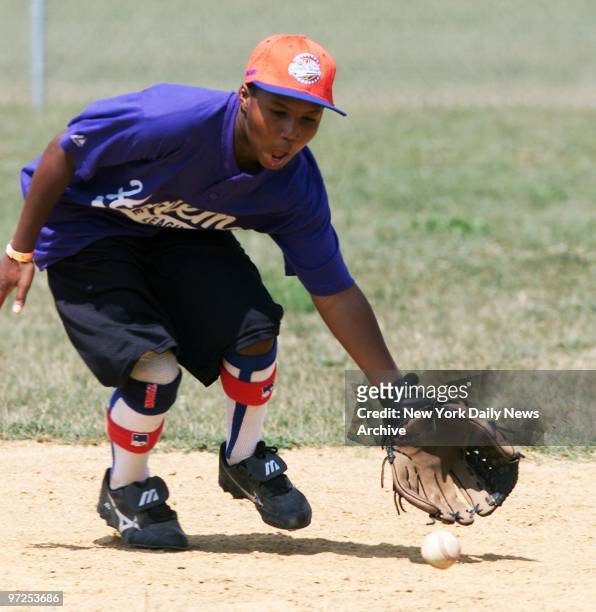 Harlem's Spencer White warms up for tomorrow's game against Worcester, Mass., in the Little League World Series semifinals at Williamsport, Pa. ,