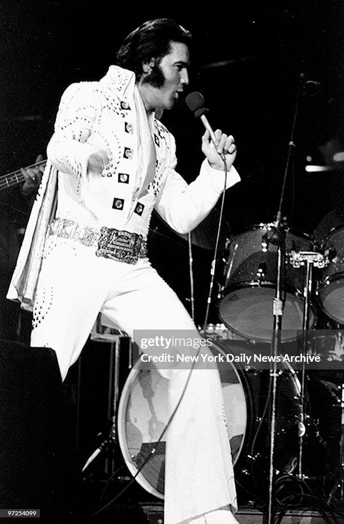 Elvis Presley on stage during a concert at Madison Square Ga