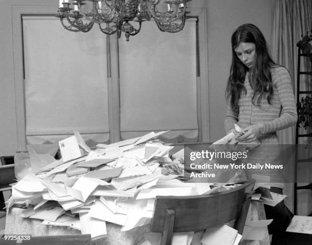 Back home in Scarsdale, N.Y., Renee Brody sifts through accumulated mail from people asking for money. , Michael James Brody Jr.