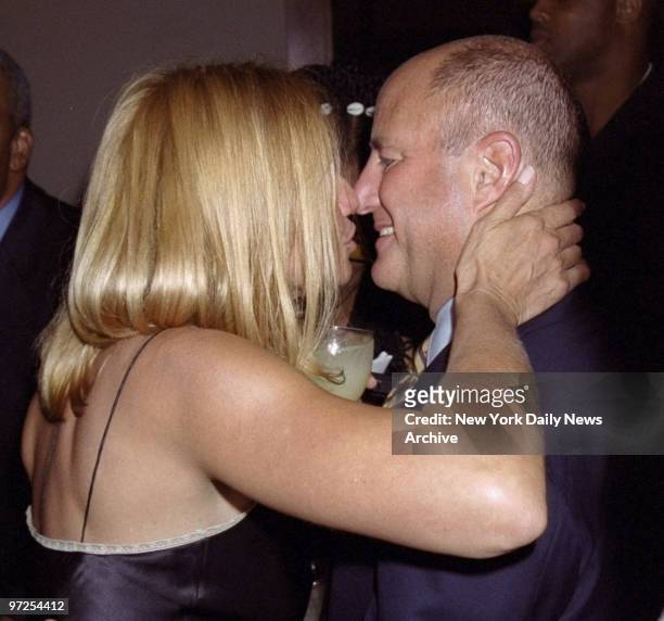Ellen Barkin and boyfriend Ron Perelman have a close encounter at the Sixth Annual Rap Roast, honoring Russell Simmons, at Chelsea Pier 60.