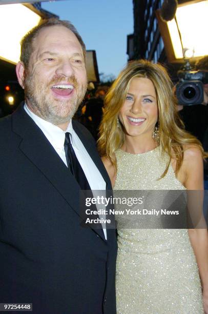 Harvey Weinstein and Jennifer Aniston arrive at the Loews Lincoln Square Theater for the premiere of the movie "Derailed." She stars in the film.
