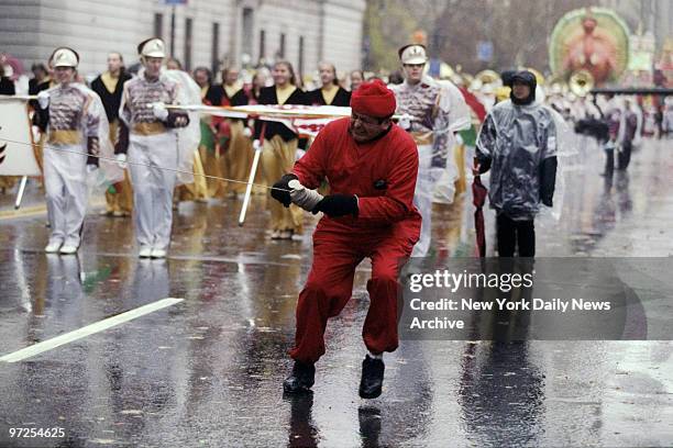 Balloon handler holds tight during the 72nd annual Thanksgiving Day Parade at Central Park West and 72nd St., the site of last years balloon accident.