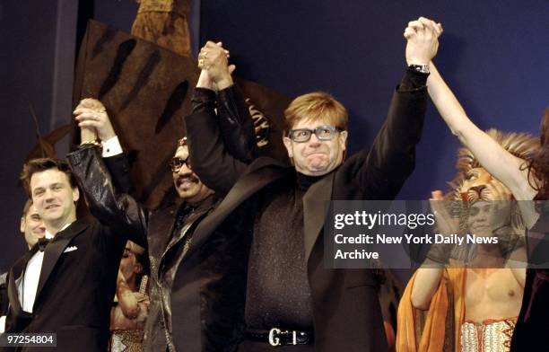 Elton John takes a bow at the finale of the "The Lion King" at the New Amsterdam theater.
