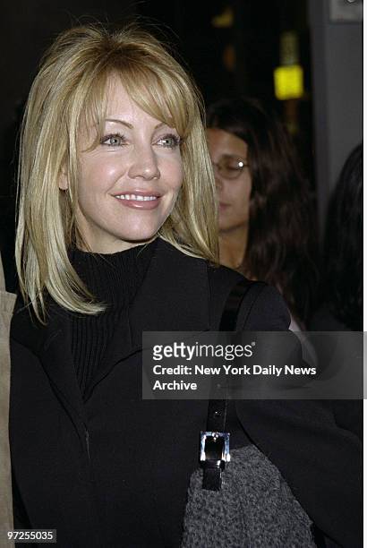 Heather Locklear is on hand at a "Spin City" cast party at Brooks Brothers. She's in the TV show.