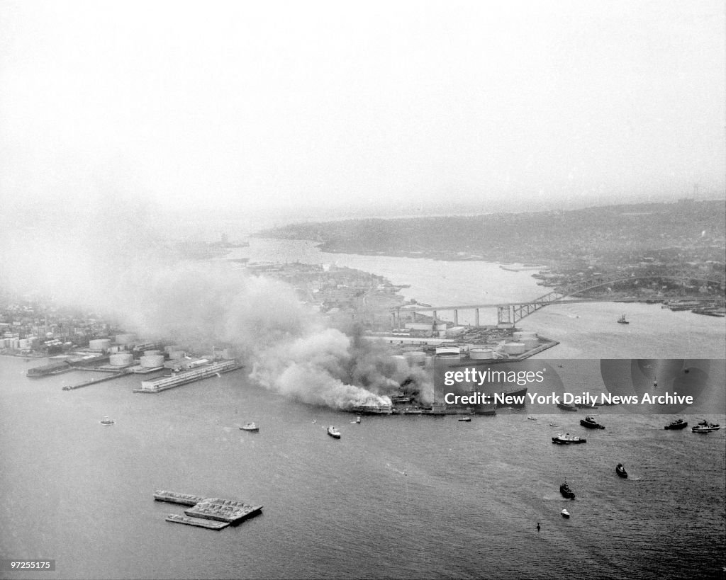 Heavy smoke pours from the British tankers Alva Cape and the