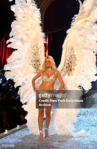 Heidi Klum wears a huge pair of angel's wings as she walks the runway during the Victoria's Secret Fashion Show at the Lexington Avenue armory.
