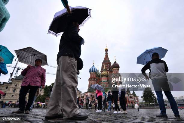 Tourists visit St Basil's Cathedral in Red Square ahead of the 2018 FIFA World Cup on June 10, 2018 in Moscow, Russia.
