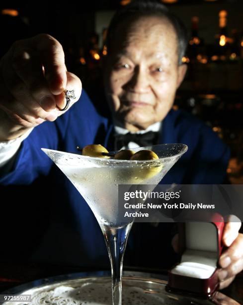 Bartender Hoy C. Wong, 87 drops a $20,000 ring into a Martini which was later used by Joe Imperato in his proposal to Melissa Beck at the Algonquin...