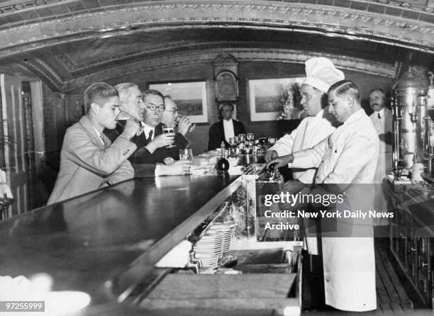 Bartenders and patrons at the Vanderbilt Hotel waiting for real beer after repeal of prohibition.