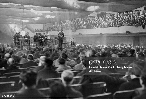 Enoch Williams, secretary of miners district 2, reads a report to a convention regarding the end of a billion dollar anthracite coal strike in...