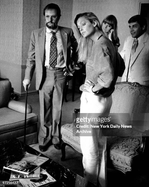Farrah Fawcett conducts a conference meeting with NBC Jay Bernstein in her hotel suite at the Pierre Hotel