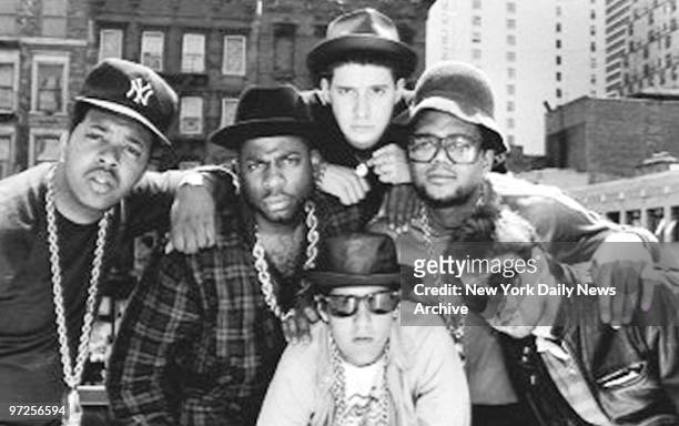 Beastie Boys and Run DMC at press conference: DJ Run , Jam Master Jay , King Adrock , Mike D , DMC and MCA