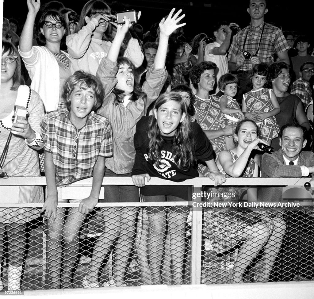 Beatles fans at Shea Stadium register varying emotions durin