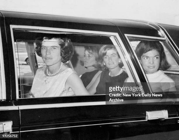 Jacqueline Kennedy leaving Altantic City Airport with sister-law, Mrs. Eunice Shiver, Mrs. Pat Lawford and Mrs. Jean Smith.