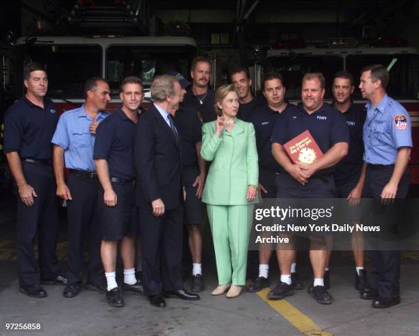 Hillary Clinton and Joe Lieberman at Thomas Edison Middle School in Coney Island. Hillary and Lieberman stand with members of Engine 318/ladder 166...