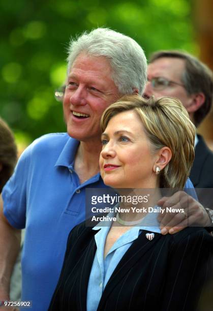 Hillary Clinton marched and took part in a service and parade while her husband President Bill Clinton walked his dog and joined her at the end of...