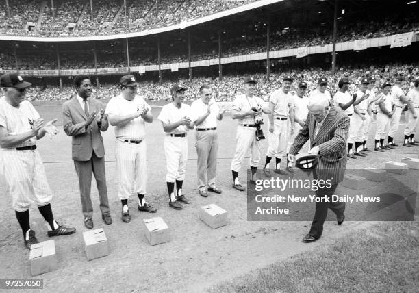 Before the Parade Passes By..., Casey Stengel, who is a parade, doffs his cap as he receives the plaudits of an All-Star lineup of Old-Timers during...