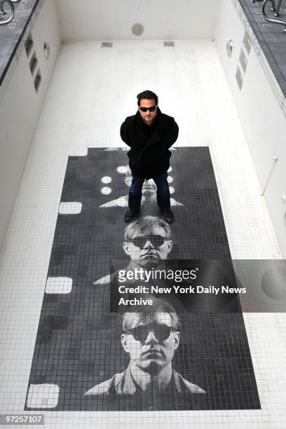 Hotelier Jason Pomeranc in the pool with the tile mosaic of Andy Warhol at the Thompson Lower East Side Hotel in Manhattan.