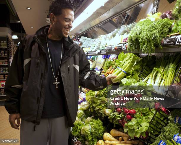 Ernesto Suncar, of Manhattan, lost 430 pounds after a gastric bypass operation. Photographed shopping at a supermarket near his home.