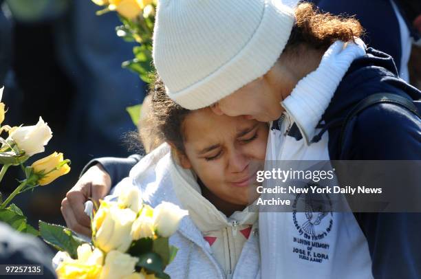 https://media.gettyimages.com/id/97257135/photo/united-states-belkis-lora-who-lost-her-brother-44-year-old-jose-lora-cries-with-alexandra-baez.jpg?s=612x612&w=gi&k=20&c=zR0nIXm0tqoVNVt4rzSV7Jktpz_G25t7F38wGgwRobA=