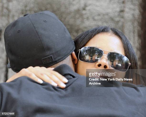 Eugenia Holmes, in shades black shirt and jeans, outside the Chas Peter Nagel Funeral Home on East 97th Street for the wake of her son Kyle Smith,...